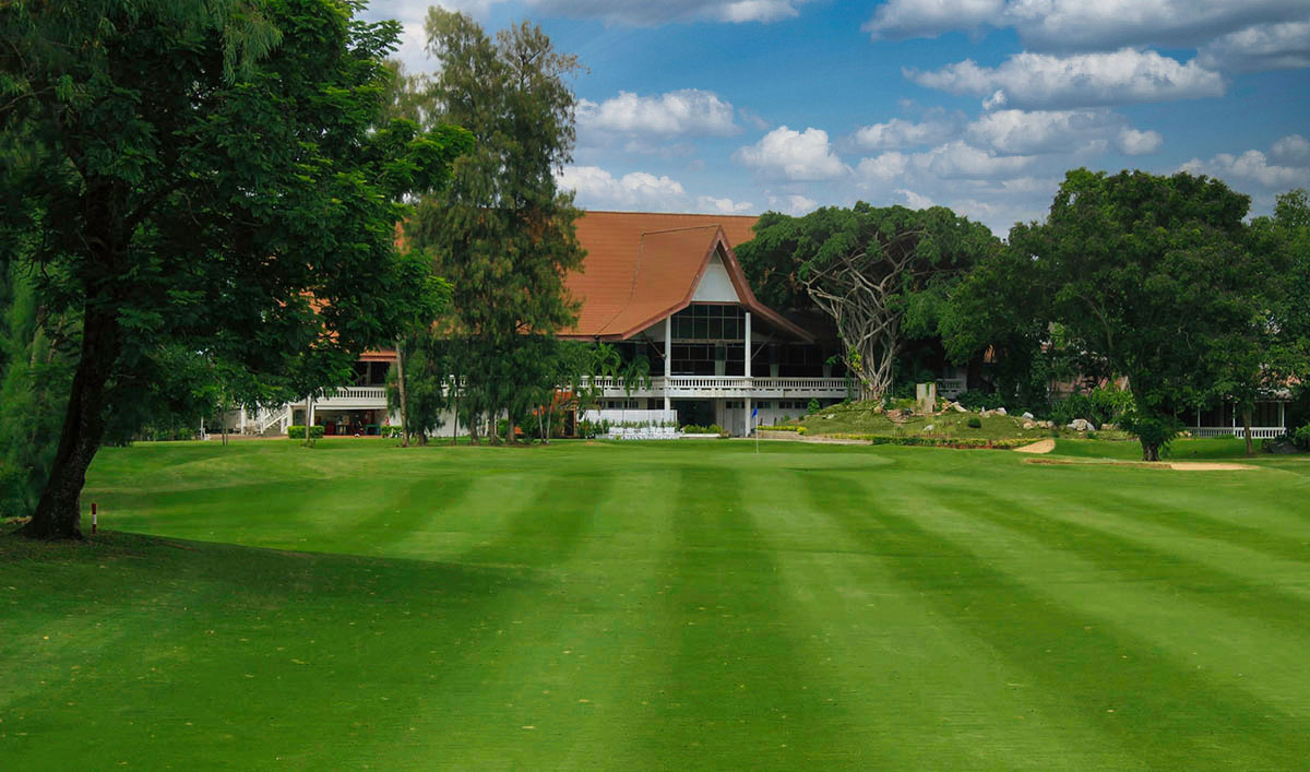 Ekachai-Golf-and-Country-Club-clubhouse-view-Sun-trees.jpg